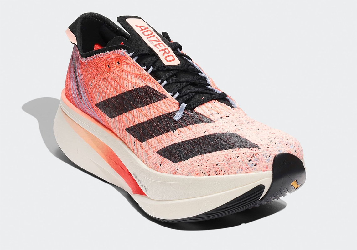 Adidas ra mắt giày chạy Adizero Prime X Strung mới với màu sắc Solar Red và công nghệ tiên tiến - 2