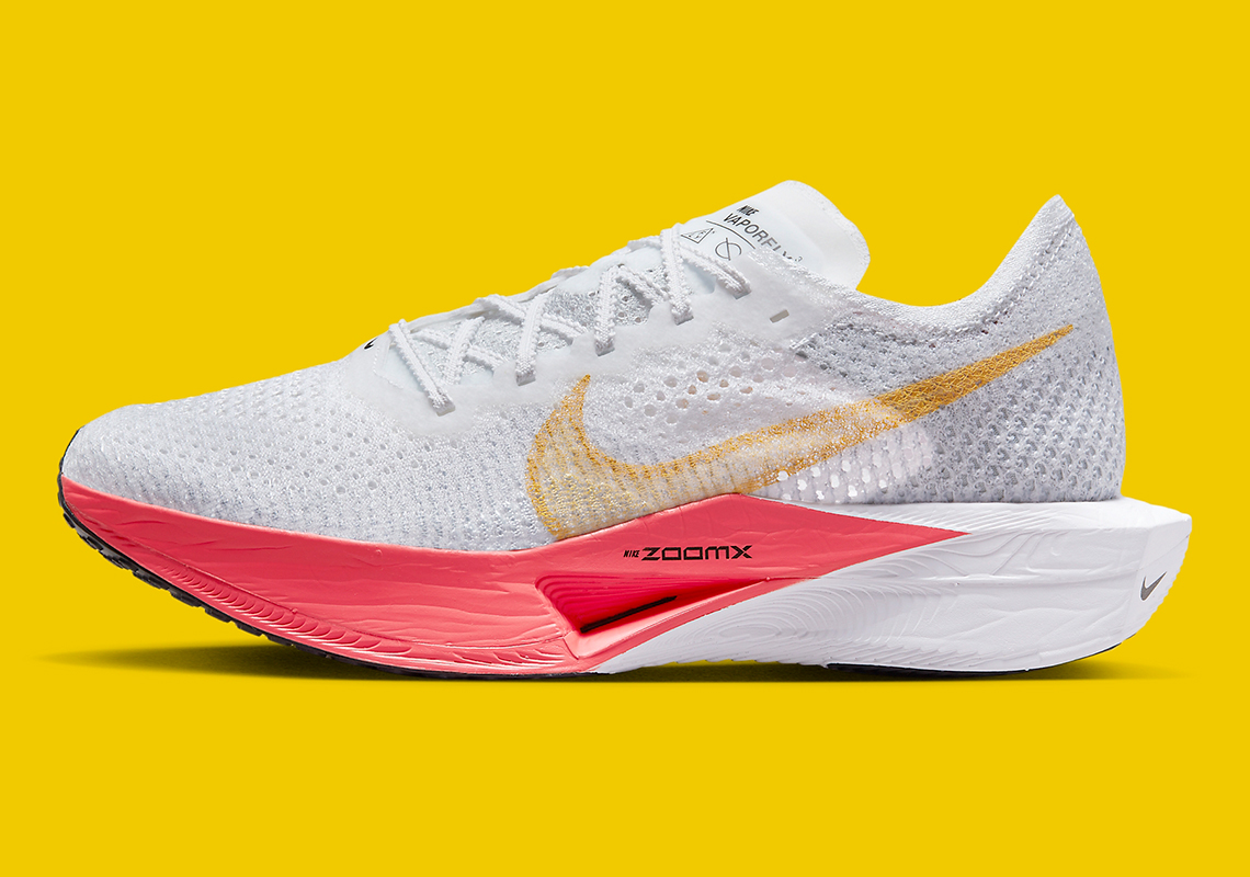 Giới thiệu Nike Vaporfly NEXT% 3 phiên bản mới với màu hồng và logo Swoosh màu vàng. - 1