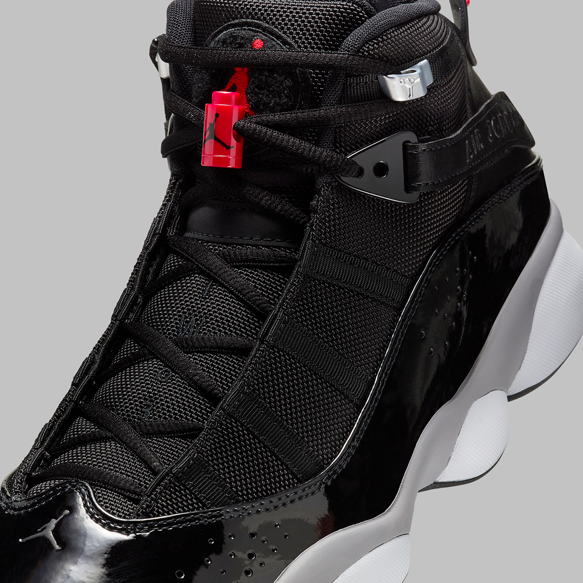 Jordan 6 Rings Black/Cement Grey/University Red/White: Sự Kết Hợp Độc Đáo của Jordan Legacy - 7
