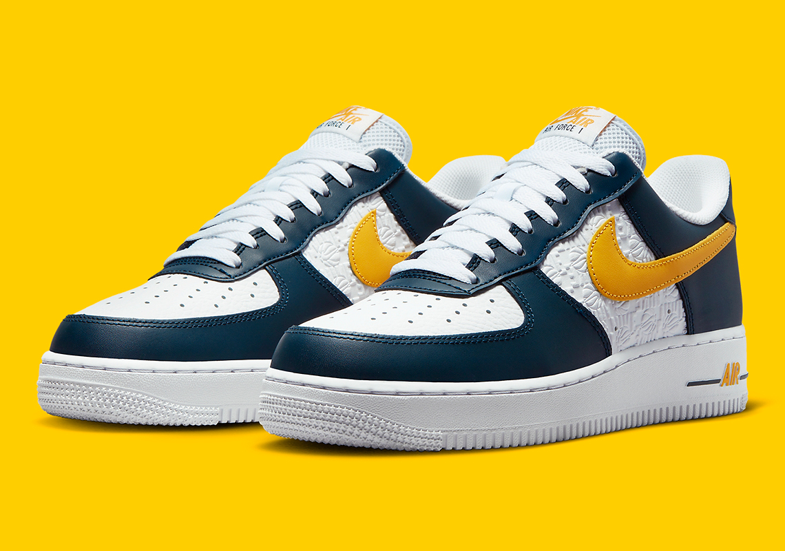 Màu xanh mòng két đậm và màu vàng xuất hiện trên Nike Air Force 1 Low EM - 1