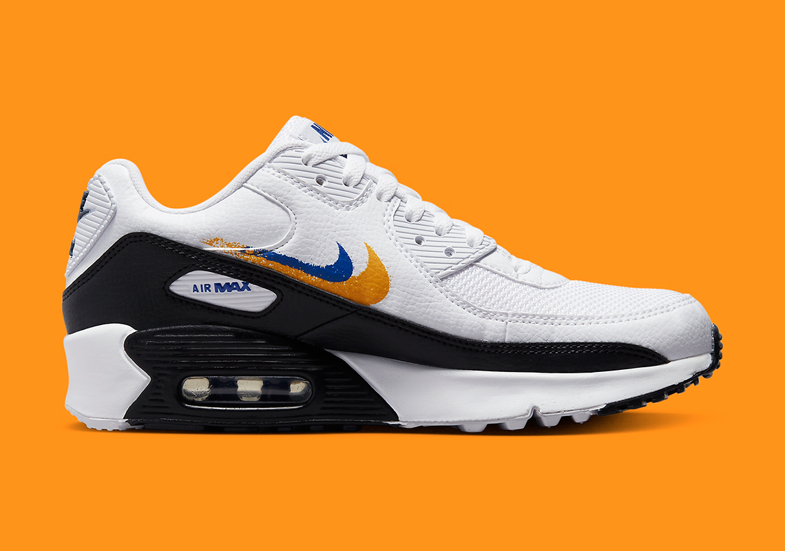 Những đường xoáy màu cam và xanh lam được vẽ tinh nghịch trên Nike Air Max 90 - 3