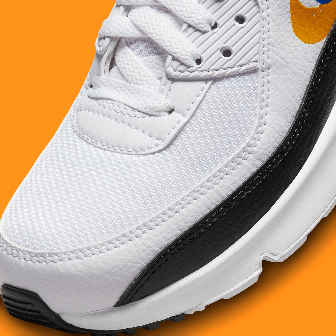 Những đường xoáy màu cam và xanh lam được vẽ tinh nghịch trên Nike Air Max 90 - 7
