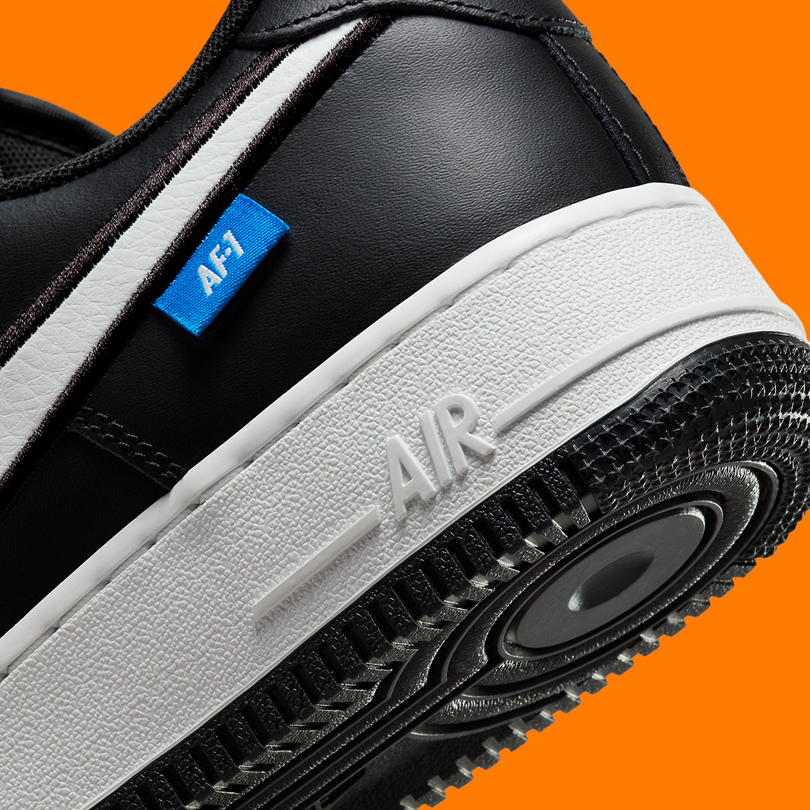 Nike Air Force 1 Low: Mẫu giày kỷ niệm 40 năm với màu đen trắng trang nhã - 8