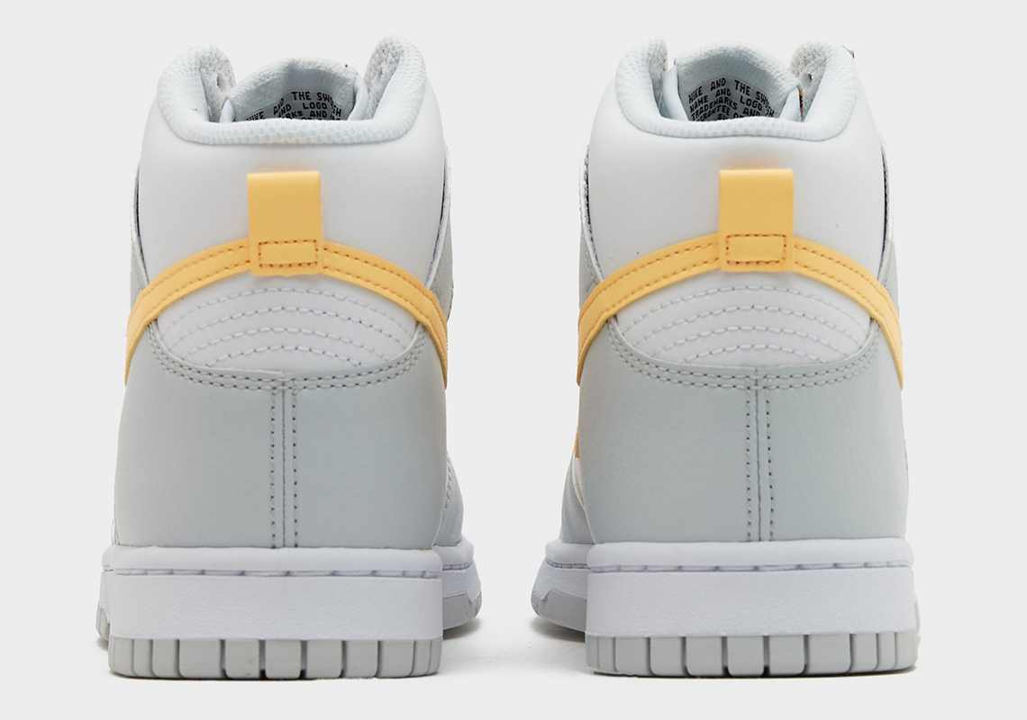 Nike Dunk High màu xám được thêm điểm nhấn màu sắc với swoosh màu vàng - 4