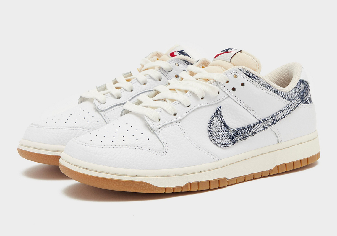 Nike Dunk Low được trang trí hoa văn trừu tượng màu xanh đậm trên swooshes. - 2