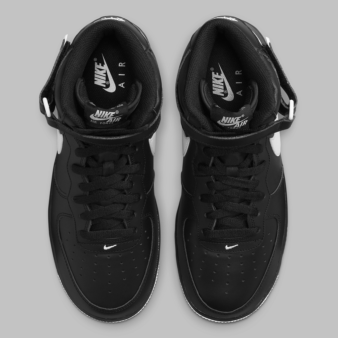 Sự kết hợp màu đen/trắng tạo lên mẫu Nike Air Force 1 Mid này - 4