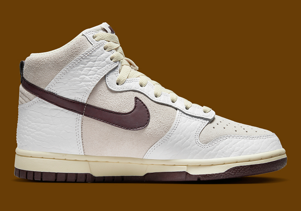 Tông màu cổ điển được phối cho đôi giày nữ Nike Dunk High này - 3